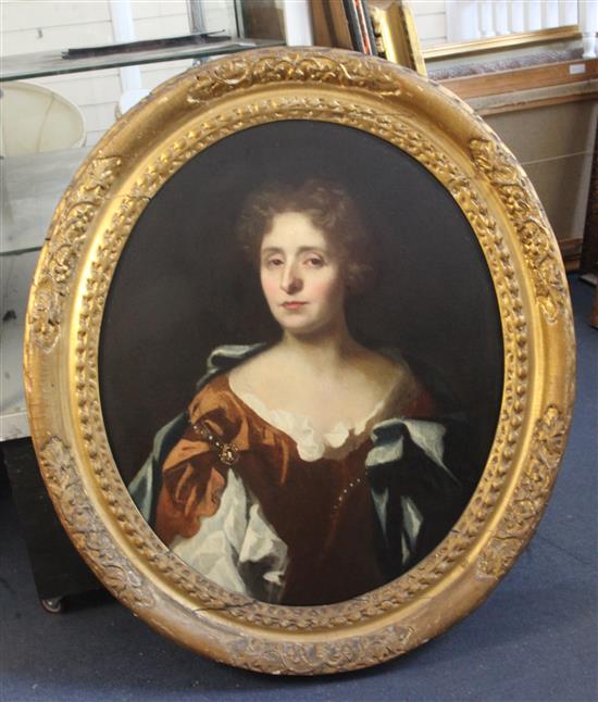Early 18th century English School Portrait of a lady, by repute a member of the Thompson family, 29 x 23.5in.